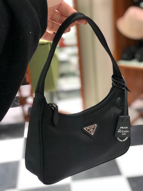 prada satin mini pouch|prada nylon mini bag price.